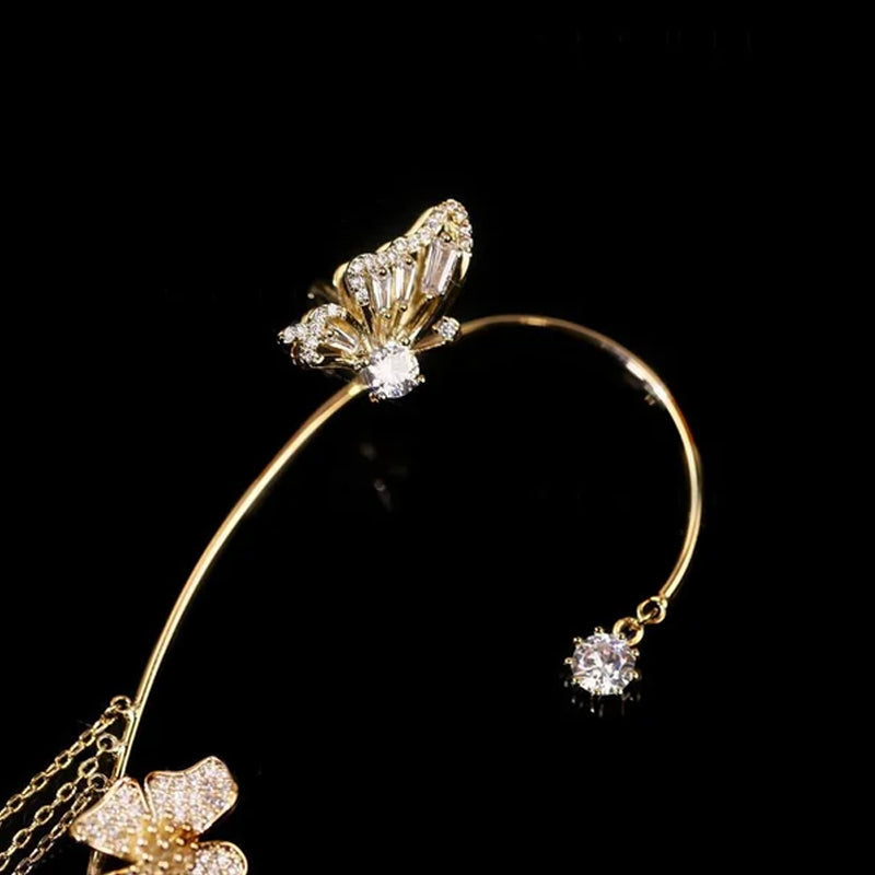 Elegante øreringer med sommerfuglblomst og dusker